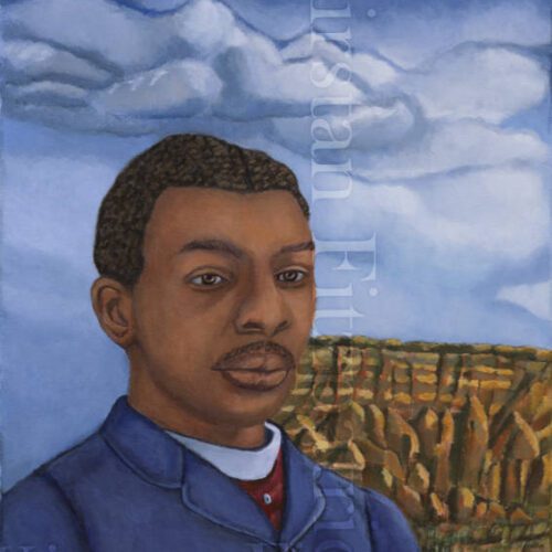 Young African American man standing in front of Santa Fe New Mexico Mountains and dark blue sky, wearing royal blue jacket.