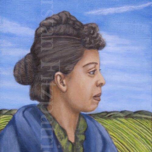African American Woman wearing blue shawl, standing in front of green field, hills, and blue cloudy sky.