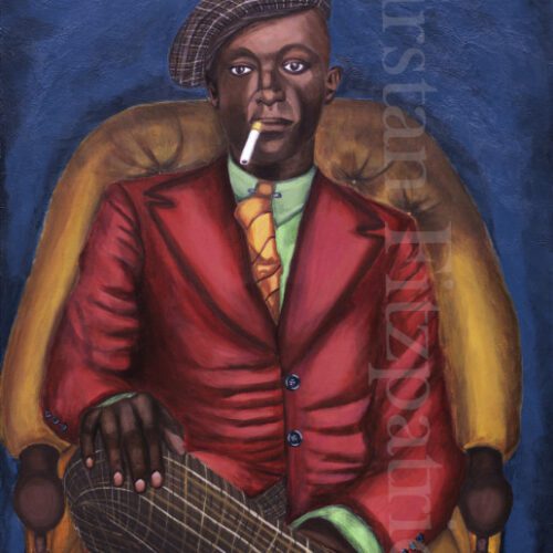 African American gentleman wearing red jacket with green shirt and orange tie, plaid cap and pants, sitting in an orange club chair.